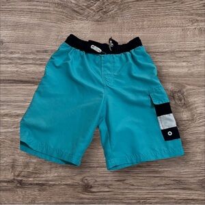 (8) Tommy Hilfiger aquamarine short for boy size M 12/14